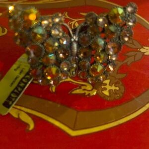 Butterfly rhinestone ring.